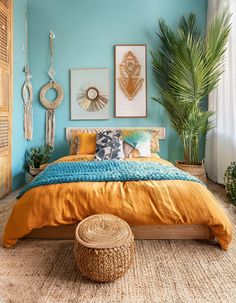 a bedroom with blue walls and yellow bedding, palm tree in the corner next to it