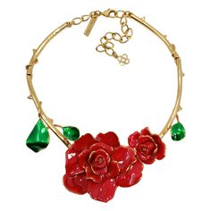 Gold plated painted rose/rosette thorned necklace with red and green resin enamel accents. Lobster clasp closure. Bold, striking colors! Hallmarks: Oscar de la Renta, Made in USA Length: 17 inches, plus 4 inches extension chain Luxury Red Flower Pendant Necklace, Luxury Red Enamel Necklaces, 22k Gold Necklace, Rose Thorns, Vestidos Vintage, 22k Gold, Tiara, Lobster Clasp, Givenchy