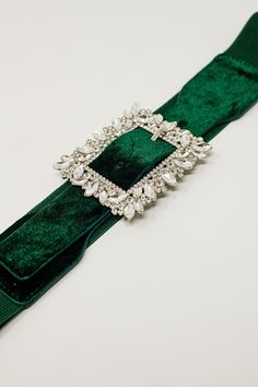 Introducing our Green Belt with Rhinestones and Adjustable Elastic, a captivating and glamorous accessory that will add a touch of enchantment to your wardrobe. Adorned with shimmering rhinestones in a strass detail, this belt exudes elegance and opulence, making it the perfect statement piece for any occasion that demands a bit of extra sparkle. The green velvet material adds a luxurious and unique touch, ensuring you stand out with a chic and fashion-forward look. The adjustable elastic featur Engagement Hand, Embellished Belt, Cloth Belt, Green Belt, Hip Belt, Rhinestone Belt, Green Sequins, Velvet Material, Rhinestone Studs