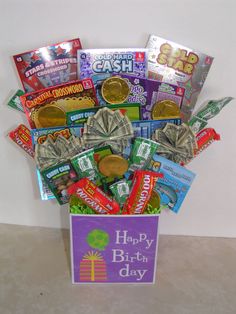 a birthday gift box filled with candy and money for someone's 30th birthday or any special occasion