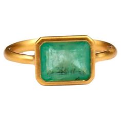 This simple ring by Scrives is composed of an emerald in an rectangular emerald cut. The stone is set in a 22kt closed gold setting. This emerald is natural, not treated and has natural & typical inclusions. This ring is handmade with 22kt mat finish gold. After wearing the jewellery for sometime, the gold will get more shinny. The band shows Scrives stamps. French size: 52.5 US size: 6.25 If you need any size change, we would be happy to do it for free. Follow us on Instagram @scrivesjewelry Green Tourmaline Ring, Simple Ring, Contemporary Ring, Tourmaline Ring, Rings Simple, Green Tourmaline, Dream Jewelry, Cluster Ring, Cocktail Rings