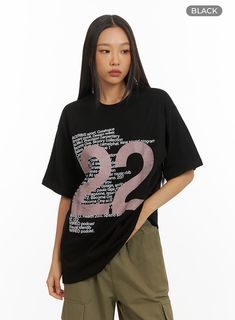 oversized-graphic-22-t-shirt-iy422 / Black Casual Number Print T-shirt For Streetwear, Black Tops With Number Print For College, College Graphic Short Sleeve Tops, College Short Sleeve Graphic Tops, Oversized Text Print Top For Campus, Campus Graphic Tee With Graphic Print, Campus Style Graphic Tee With Graphic Print, Sporty Letter Print School Top, Sporty Letter Print Top For School