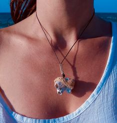 This Unique Limpet Shell Sea Rock Pendant, Ethnic Style, is handmade with love from Greece. This extraordinary summer necklace consists of a white biogenic sendimentary sea rock with two visible limpets on its surface, and it's personally collected on one of my summer strolls along my favorite beach in Greece. It's framed with a natural brown sea shell on a thick decorative linen cord and tied to a brown cotton cord adorned with a beige macrame detail and two wooden beads at the edge. One-Of-a-K White Spiritual Jewelry For Vacation, Beach Spiritual Hand Wrapped Necklaces, Hand Wrapped Spiritual Necklaces For The Beach, Spiritual Hand Wrapped Necklaces For Beach, Spiritual Hand Wrapped Necklace For Beach, White Bohemian Pendant Necklaces, Natural Color Spiritual Jewelry For Beach, Natural Spiritual Beach Jewelry, Spiritual Natural Jewelry For The Beach