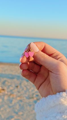 Dainty pink, pearl white, or light turquoise enamel 18k gold plated heart charms on gold french wire or huggy earrings. MATERIALS 14k gold plated brass base premium metal 18k gold-filled (hypoallergenic) Hypoallergenic Pink 14k Gold Filled Jewelry, Dainty Pink Jewelry With Dangling Charms, Pink 14k Gold Filled Dangle Jewelry, Pink Heart-shaped Jewelry With Dangling Charms, Dainty Adjustable Heart Earrings, Dainty Adjustable Heart-shaped Earrings, Cute Pink Double Heart Jewelry, Cute Gold Earrings With Heart Charm, Handmade Pink 14k Gold Filled Earrings