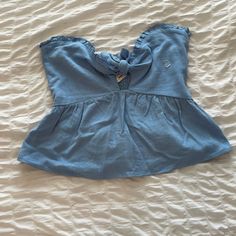 Cute Blue Strapless Pacsun Top. Never Worn. Size S But Probably Need A Bigger Chest To Keep It Up Or Need To Add Straps To It Light Wash Top For Beach In Summer, Light Wash Summer Beach Top, Chic Light Wash Tops For Beach, Light Blue Sleeveless Halter Top For Spring, Chic Light Wash Tops For The Beach, Chic Light Wash Beach Tops, Blue Cropped Tube Top For Summer, Summer Bandeau Top For Brunch, Summer Bandeau Top For Day Out