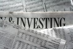 an image of a newspaper with the words investing guy on it and some papers in front of it