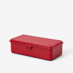 a red plastic box with lid on a white background, it is empty and there are no objects in the photo