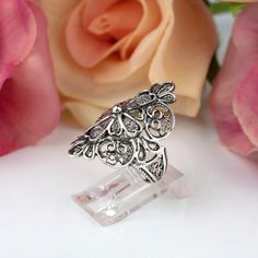 "This 925 Sterling silver filigree art lace detailed women cocktail ring will exact fit your style. Beautifully detailed intricated ornaments filigree art lace flower design statement ring will be favorite gift option for birthday, anniversary, thanksgiving or Christmas for her or yourself.  Gorgeous design, exquisite workmanship. The ring face length is 1.15\" and width is 0.60\" Comes with a gift box.  Filigree is made of delicate metal strands that have been skillfully fashioned to create an outstanding combination of old and modern art. Originating in Mesopotamia, Anatolia. It is made of delicate metal strands that have been skillfully fashioned to create an outstanding combination of old and modern art." Metal Embroidery, The Ring Face, Filigree Jewelry, Bold Rings, Embroidery Cross, Sterling Silver Filigree, Mesopotamia, Filigree Ring, Lace Embroidery