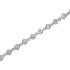 Abraza tu elegante muñeca con esta exquisita pulsera de plata de ley. Articulada con un diseño redondo único, la pulsera está realzada con diamantes de 1,33 ct. Esta extraordinaria pulsera genera intriga con su encanto inigualable. El diseño favorecedor y el toque encantador hacen de la pulsera una quintaesencia de belleza inigualable. Sterling Silver Bracelet With Pave Diamond Setting, Dazzling Round Sterling Silver Diamond Bracelet, Silver Diamond Bracelet With Pave Setting, Dazzling Round Diamond Bracelet With Pave Setting, Dazzling Bracelets With Pave Setting, Elegant Silver Tennis Bracelet With Halo Setting, Formal Sterling Silver Bracelet With Pave Setting, Sterling Silver Bracelet With Pave Setting For Formal Occasions, Formal Silver Tennis Bracelet With Halo Setting