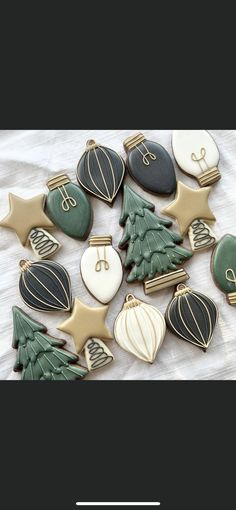 christmas cookies decorated with different shapes and designs