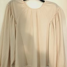 Beige Georgette Chiffon Blouse Dolman Sleeves Cuffs Allows For Length Of Sleeves This Is The Same Style And Description Of The Black Dressy Chiffon Blouse Next To This Listing New With Tags Chic Long Sleeve Chiffon Blouse, Flowy Long Sleeve Chiffon Blouse, Feminine Chiffon Blouse For Brunch, Chiffon Blouse With Sheer Sleeves For Spring, Fall Chiffon Blouse For Brunch, Chiffon Blouse For Brunch In Fall, Sheer Puff Sleeve Chic Blouse, Chiffon Blouse With Blouson Sleeves, Sheer Chiffon Blouse For Work