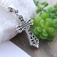 "The Irish Catholic priest will have no hesitation telling you that the Celtic Cross is a symbol of eternity that emphasizes the endlessness of God's love as shown through Christ's sacrifice on the cross. The crucifixion and resurrection Christ continues to offer the hope of salvation to the faithful throughout all time. Cast using 100% sterling silver, no pewter, nickel or lead was used to create this tree of life, buy with peace of mind. . Big collection of Crosses this link http://etsy.me/1kX Celtic Cross Necklace, Om Jewelry, Irish Cross, Irish Catholic, Harmony Ball, The Crucifixion, Silver Cross Necklace, Catholic Priest, Symbolic Jewelry