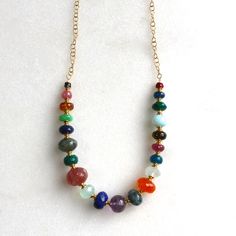 Gorgeous gemstones in every hue, this multi gemstone necklace features AAA gemstones in a variety of polished stones. The piece which is 18 inches in length and secures with a toggle clasp. A one and only. Additional length can be added, or removed, please inquire. Multicolor Single Strand Gemstones As A Gift, Spiritual Multicolor Necklace With Gemstone Accents, Multicolor Spiritual Necklaces With Gemstone Accents, Spiritual Multicolor Gemstone Necklace, Multicolor Tumbled Jewelry For Healing, Multicolor Spiritual Gemstones With Accents, Spiritual Multicolor Gemstones With Accents, Multi Gemstone Necklace, Toggle Clasp