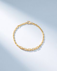 Crafted with solid 18-karat gold, this block-chain bracelet presents a symphony of four-sided links. It features five links set with baguette white diamonds on all four sides. The medium, block-chains add a contemporary edge to the timeless design making it perfect for casual or evening wear. Details 18k yellow gold, rose gold or white gold 2.05 carats of baguette white diamonds Measures 7" inches in length, adjustable at 6.5" inches Model styling 7" bracelet in yellow gold, first from the right Block Chain, White Rose Gold, White Diamonds, Gold Rose, Diamond White, Evening Wear, Chain Bracelet, Fashion Models, Timeless Design