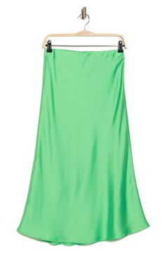 Elevate your wardrobe with this pull-on bias satin midi skirt for elegant, feminine style. 31" length (size S) Elasticized waist Pull-on style Satin construction 97% polyester, 3% spandex Machine wash cold, line dry Made in USA Model’s stats for sizing: 5’10” height, 34” bust, 27” waist, 35” hips. Model is wearing size S. Summer Midi-length Bias Cut Skirt, Spring Satin Relaxed Fit Skirt, Spring Satin Midi Bottoms, Summer Satin Midi Bottoms, Satin Midi-length Bottoms For Spring, Silk Midi Skirt For Spring, Spring Satin Flowy Skirt, Spring Flowy Satin Skirt, Satin Flared Skirt For Spring