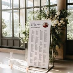 a table plan sitting in front of a window