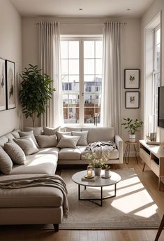 a living room filled with furniture and a flat screen tv