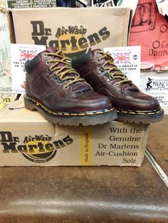 These are certainly an extremely old and very rare pair of Made in England Dr Martens boots. These were made in the late 1980s.  They are a 6 hole boot finished in a fantastic Burgundy Analine leather.  It comprises of 3 holes and 3 speed lace rings. It sits on the ankle and has padded collar for extra comfort.  The sole unit is the stronger, more durable commando version.  These are the only pair. They are a UK size 6, European 39, mens usa 7, ladies usa 8 Vintage Lace-up Boots With Leather Footbed, Vintage Lace-up Combat Boots For Streetwear, Vintage Moc Toe Boots With Rubber Sole, Vintage Moto Boots With Steel Toe, Retro Leather Boots With Vibram Sole, Vintage Lace-up Moto Boots With Leather Footbed, Vintage Lace-up Moto Boots With Reinforced Toe, Vintage Style Steel Toe Boots With Round Toe, Vintage High-top Boots With Rubber Sole