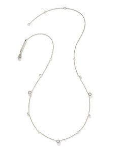 A delicate necklace adorned with moments of subtle sparkle. The Davie Sterling Silver Trio Strand Necklace in White Sapphire is an elevated layering piece designed to shine for years to come, featuring a minimalist design that’s perfect for everyday wear. Minimalist Single Strand White Gold Diamond Necklace, Minimalist White Gold Single Strand Diamond Necklace, Everyday White Gold Diamond Necklace With Delicate Chain, Minimalist White Gold Necklace For Layering, Minimalist White Gold Necklaces For Layering, Minimalist White Gold Layering Necklaces, Elegant Everyday Station Necklace With Satellite Chain, Elegant Station Necklace With Satellite Chain For Everyday, Modern White Gold Diamond Necklace With Delicate Chain