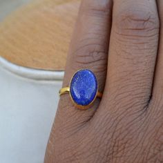 Lapis Lazuli Yellow Gold Ring-9K,14K,18K,22K Solid Gold Rings-January Birthstone Gold Ring -Gold Wedding Ring -Yellow Gold Ring- Lapis Ring Available in 9K,14k,18K,22K yellow solid gold bezel and solid yellow gold ring are both shined to an extremely high polish. But if you prefer it in matte convo me after purchasing. The main stone is natural Lapis Lazuli Gemstone. The pictures have been enlarged to show the details. The band is about 2 mm wide and 1 mm thick. This ring is made to order in you Gold Rings With Gemstone For Fine Jewelry, Oval Gemstone Gold Stackable Rings, Classic Gold Opal Gemstone Ring, Gold Rings With Gemstone For Promise, Gold Sterling Silver Rings With Gemstone, Gold Gemstone Rings For Gift, Sterling Silver Gold Rings With Gemstone, Classic Round Gold Gemstones, Gold Opal Gemstone Ring Gift