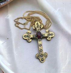 "This is a beauty. The chain measure 60\" in length and the cross measures approx 4 1/8\" in length. This is unsigned and I don't believe goes with the Trifari necklace as an original but very pretty" Byzantine Cross, Fort Sill, The Cross, Antique Gold, Pendant Necklaces, Jewelry Necklace Pendant, Gold Tones, Jewelry Necklaces, Pendant Necklace