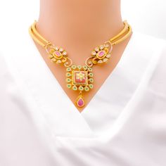 This luxurious set, crafted in 22k gold with an antique finish, weighs 70.3 grams and radiates opulence. The design integrates Kundan stones within its floral motifs, extending over an 18-inch length, complemented by 0.8 inches of adjustable links and a secure hook lock. Accompanied by matching earrings, 2.2 inches in length with screw-back posts, this set epitomizes elegance. Ideal for those seeking a blend of traditional aesthetics and modern sophistication, it's perfect for enhancing any gran 22k Gold Kundan Temple Necklace, 22k Gold Kundan Necklace With Intricate Temple Jewelry Design, Gold Fusion Style Necklace With Elegant Design, 22k Yellow Gold Bollywood Kundan Necklace, Heavy 22k Gold Necklace For Diwali, Bollywood Style 22k Yellow Gold Kundan Necklace, Festive 22k Gold Emerald Necklace, 22k Gold Hand-set Kundan Necklace In Temple Style, 22k Gold Kundan Necklace In Temple Style