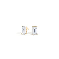 Emerald Cut Diamond Stud Earrings . These sleek and eye-catching stud earrings feature glistening emerald-shaped diamonds secured by push back posts. Classic White Gold Baguette-cut Earrings, Modern Yellow Gold Emerald Cut Earrings, Classic Gold Baguette Cut Diamond Earrings, 14k Gold Diamond Earrings With Prong Set Baguette Cut, 14k Gold Baguette Cut Diamond Earrings With Prong Setting, 14k Gold Diamond Earrings With Baguette Cut, Gia Certified Yellow Gold Lab Grown Diamond Earrings, 14k Yellow Gold Diamond Earrings With Vs Clarity, Timeless Yellow Gold Baguette-cut Earrings