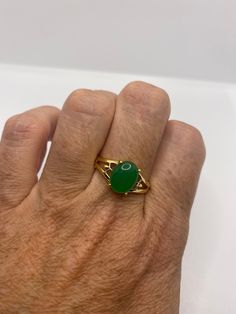 Vintage Lucky Green Nephrite Jade ring Fun jade is color enhanced Large green nephrite jade Ornate German Gold finished Vintage ring, does not tarnish, NOT sterling Size 5.75, 7, 7.5 or 9 All rings are shipped free in the US in a nice gift box. Check out our over a THOUSAND great reviews Engraving is $4 per letter and is not always perfect depending on the piece. It can take a few days if the jeweler is busy. This is payable to Paypal Judithsltd@gmail.com Green Emerald Spiritual Ring For Anniversary, Green Emerald Ring For Anniversary, Spiritual Green Open Ring, Green Opal Ring Spiritual Style, Green Opal Spiritual Ring, Green Cabochon Emerald Ring For May Birthstone, Green Opal Round Ring For May Birthstone, Spiritual Jade Gemstone Rings, Green Jade Spiritual Rings