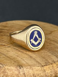 Welcome to Caviar and Cobwebs ! Thanks for stopping by. Enjoy browsing!  Here we have a very collectable 9k yellow gold and blue enamel swivel secret Masonic / Freemason ring. Reversible and engraved on one side. in size 10 Gift wrapped and shipped safe and secure from Canada.  Box for display purposes only* Classic Blue Signet Ring Stamped 14k, 14k Gold Enamel Ring With Polished Finish As Gift, 14k Gold Enamel Ring With Polished Finish For Gifts, Oval Gold Enamel Ring In 14k Gold, Yellow Gold Oval Enamel Ring For Gift, Yellow Gold Enamel Ring With Polished Finish As Gift, Oval Yellow Gold Enamel Ring For Gift, Oval 14k Gold Enamel Ring Gift, 14k Gold Enamel Ring With Polished Finish For Anniversary