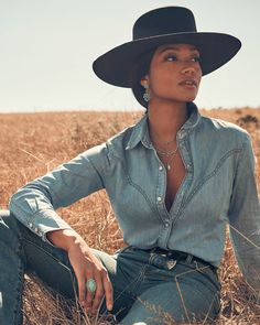 The Wrangler® x Yellow Rose by Kendra Scott Denim Western Shirt in Washed Down Medium Blue celebrates everything we love about Western wear: a tapered fit, rugged material, and pearl snaps in our signature Davie shape. Wear this classic piece with your favorite pair of jeans or layer it for a dimensional look that’s in style both on the ranch and in the big city. This item is a part of the Wrangler® x Yellow Rose by Kendra Scott collection, a limited-edition collaboration that was created for bo Canadian Tuxedo Women Cowgirl, Western Shirts Baha Ranch Western Wear, Modern Western Shirts, Western Denim Shirt Women, Wrangler Western Wear Logo, Ranch Outfits, Denim Western Shirt, Urban Cowgirl, Classy Cowgirl