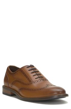 Stylish broguing lends vintage-inspired style to a polished leather oxford set atop a navy-blue rubber sole for slip-free strides. Leather upper/textile lining/rubber sole Imported Brown Wingtip Dress Shoes With Rubber Sole, Brown Goodyear Welted Oxfords With Round Toe, Brown Almond Toe Dress Shoes With Brogue Detailing, Classic Brown Almond Toe Oxfords, Classic Brown Oxfords With Leather Sole, Cognac Leather Shoes With Brogue Detailing For Semi-formal Occasions, Classic Brown Oxford Leather Shoes, Semi-formal Cognac Oxfords With Brogue Detailing, Cognac Oxfords With Brogue Detailing And Almond Toe