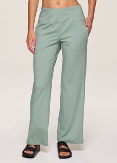 Whether you pair it with your favorite denim jacket or a sports bra for yoga, our Lotus Wide Leg Pant is the ultimate studio-to-street piece. A relaxed, wide leg design keeps you comfortable and on trend while the flat-front elastic waistband ensures an ultra flattering look and fit without sacrificing comfort. Complete with side pockets that provide the functionality you're looking for, you can unwind and reset in these versatile women's sweatpants. Stretch Wide-leg Yoga Pants For Lounging, Wide-leg Yoga Pants With Pockets For Loungewear, Long Yoga Pants For Relaxation, Sporty Mid-rise Bottoms For Loungewear, Stretch Sweatpants With Comfort Waistband For Relaxation, Solid Color Yoga Pants With Comfort Waistband For Relaxation, Athleisure Pants With Comfort Waistband For Relaxation, Sporty Wide Leg Bottoms For Relaxation, Sporty Wide Leg Yoga Pants For Lounging