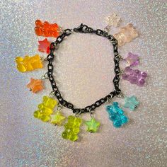 Fulfill your inner sweet side with this rainbow gummy bear charm bracelet! #gummybearbracelet #gummybearjewelry #decorakei #rainbowcore #decorakeijewelry #cutejewelry #cutebracelet #handmadejewelry #jewelryshop #etsyjewelry Cute Nickel-free Charm Bracelet For Friendship, Handmade Kawaii Jewelry For Friendship, Cute Multicolor Dangle Jewelry, Fun Rainbow Hypoallergenic Jewelry, Cute Rainbow Charm Bracelet For Gift, Cute Rainbow Charm Bracelet As Gift, Cute Dangling Charms Jewelry For Friendship, Cute Multicolor Charm Bracelet For Jewelry Making, Cute Jewelry With Dangling Charms