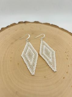 Handmade beaded earrings. 2.75 inches long. Sterling silver hooks. Handmade Beaded Earrings, Handmade Earrings Beaded, Wedding Jewelry Earrings, Bead Embroidery, Wedding Earrings, Sterling Silber, Beaded Earrings, Wedding Jewelry, Etsy Earrings