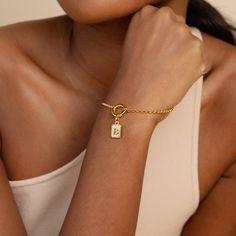 ⚡️Trending Alert: Popular and in high demand ⚡️ Elevate your accessory game with our customizable Mother of Pearl Initial Charm. Versatile and elegant, this charm adds a personalized touch to any necklace, bracelet, hoop earrings, and more, offering endless styling possibilities. Make it uniquely yours or gift it to a loved one by selecting your or their initial, turning this exquisite piece into a cherished keepsake ♡ Material: Vermeil over Brass Finish: 18K Gold Featuring ~9x11mm Mother of Pea Gold Plated Jewelry With Removable Charms For Everyday, Everyday Gold-plated Jewelry With Removable Charms, Everyday Gold Plated Jewelry With Removable Charms, Modern Metal Jewelry With Charms, Gold Plated Charms With Lobster Clasp As Gift, Gold Plated Charms With Lobster Clasp For Gift, Minimalist Gold Jewelry With Removable Charms, Modern Tarnish Resistant Jewelry For Gifts, Stainless Steel Initial Pendant Jewelry, Tarnish Resistant