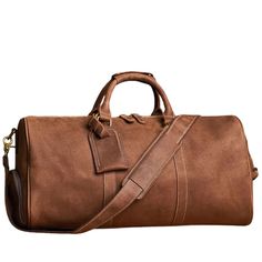 This Genuine Leather Duffel Bag is the ideal travel companion for both men and women. Made from high quality cow leather, it offers a large capacity for all your essentials, including a 15-inch laptop. With an adjustable and removable shoulder belt, this lightweight bag is perfect for stress-free travel. A distinctive feature of this duffel bag is a specifically designed shoe pocket. This compartment is separate from the main storage area, allowing you to keep your shoes isolated from your cloth Leather Duffel Bag, Leather Duffel, Shoulder Belt, Lightweight Bag, Storage Area, Duffel Bag Travel, Luggage Bag, Vintage Casual, Crazy Horse