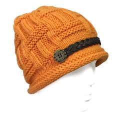 This knitted cap features a button strap across the front and can be slouched in the back. A comfy cap that can go over the ears, this hat will keep your head warm while looking stylish. The perfect winter accessory for skiing or outdoor play. Available in a variety of colors. Dimensions: 22 inch circumference, 8 inch height. Material: Acrylic. Fashion Apron, Fishing Wedding, Earring Jewelry Box, Lace Tape, Ski Cap, Towel Crafts, Pencil Case Stationery, Baby Hair Accessories, Spa Gifts Set