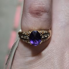 Preowned Ring In Very Good Condition. Shows Very Little Surface Wear From Previous Use. Gold And Diamonds Have Been Authenticated By A Gia Certified Employee. 14k Gold Purple Ring With Diamond Accents, Yellow Gold Amethyst Ring With Round Cut Accent Stones, Yellow Gold Amethyst Ring With Accent Stones, Round Cut, Elegant Gold Amethyst Ring With Diamonds, Formal Diamond Birthstone Ring With Gemstone Accents, Purple 14k Gold Ring With Diamond Accents, Elegant Gold Amethyst Diamond Ring, Fine Jewelry Purple Diamond Ring With Gemstone Accents, Classic Diamond Ring With Gemstone Accents For Anniversary