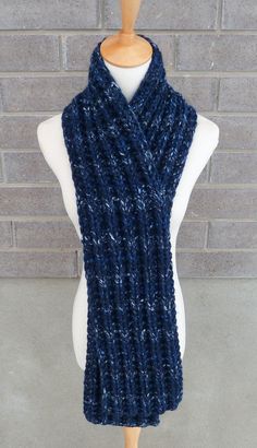 "This beautiful hand knitted scarf is made with Super Bulky and Soft Wool Blend Yarn (80% Acrylic, 20% Lambswool). Classic ribbed pattern, it looks the same on both sides. The scarf can be worn in multiple ways. Very beautiful colors: shades of navy, blue, and light blue. The colors may appear slightly different on different monitors. Measures: 63\"- 65\" (160-165 cm) long x 7\" (18 cm) wide. From a smoke-free home. Care instructions: Hand wash in cool water and dry flat." Cozy Blue Chunky Knit Pattern, Cozy Blue Knit Knitting Pattern, Blue Knitted Scarves For Winter, Blue Knitted Winter Scarves, Knit Acrylic Yarn Scarves, Blue Knitted Yarn Scarves, Hand Knitted Acrylic Yarn Scarf For Cold Weather, Blue Knitted Yarn Scarf, Hand Knitted Acrylic Yarn Scarves For Cold Weather