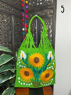 "Artisanal Handwoven Mexican Floral Tote Bag, great for your Beach or Boho look. Eco-friendly, super handy for groceries or to carry your books. Overview *Thread material *approximate measurements: 15\" tall x 16\" wide Care *hand wipe only *delicate care Please email me your questions before buying. All of my items come from a smoke and pet free environment. I WILL BE PROCESS YOUR ORDER IN 1-2 DAYS. If you need the item expressed shipped please contact me to request it and the listing will be a Hand Wipes, Stationary Paper, Extra Fabric, Boho Look, Grocery Bag, Clothing Items, Top Handle Bag, Reusable Tote Bags, Hand Weaving