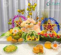 a table topped with lots of different types of food