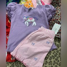 Matching Luigi Top And Shorts Set! Size 5 Super Cute Too Worn Once And Shorts Nwt Cute Purple Cotton Bottoms, Cute Cotton Pants For Playwear, Cute Spring Sets With Elastic Waistband, Pink Cotton Pants For Playtime, Cute Purple Spring Sets, Purple Summer Playwear Sets, Cute Purple Shorts For Spring, Purple Playwear Sets For Summer, Summer Purple Playwear Sets