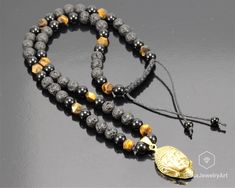 "Buddha Necklace Natural Tiger Eye Black Lava Onyx Beaded Protection Best Friend Gift Boyfriend Gift Handmade Necklace Boho Necklace Gift -ALL THE PRODUCTS AT ELISAJEWELRYART ARE HANDMADE AND MADE WITH NATURAL BEADS. -WHAT DOES THE ONYX STAND FOR A powerful protection stone, Black Onyx absorbs and transforms negative energy, and helps to prevent the drain of personal energy. Black Onyx aids the development of emotional and physical strength and stamina, especially when support is needed during t Spiritual Black Beaded Crystal Necklace, Black Spiritual Crystal Necklaces, Black Spiritual Crystal Necklace, Black Beaded Chain Beads As Gift, Black Beaded Chain As A Gift, Black Beaded Chain For Gift, Handmade Spiritual Black Beads, Handmade Black Spiritual Beads, Adjustable Black Beads For Gifts