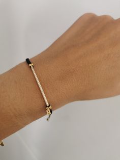 W H A T ∙ M A K E S ∙ T H I S ∙ S P E C I A L This beautiful CZ BAR bracelet adjusts to fit different wrist sizes. This dainty bracelet looks gorgeous stacked with other bracelets and watch. Simple, delicate and versatile... you'll want in your collection. - we use only the finest quality materials - all components are 100% sterling silver or 18k Gold plated (Nickel free) - all pieces are designed in our happy studio D E T A I L S * Available in sterling silver or Crafted in Gold plated .925 ste Adjustable Diamond Bracelets For Gift, Luxury Adjustable Cord Jewelry As Gift, Adjustable Diamond Bracelet Gift, Minimalist Adjustable Diamond Bracelet Gift, Dainty Adjustable Diamond Bracelet As Gift, Adjustable Sterling Silver Diamond Bracelet For Everyday, Everyday Jewelry Bracelet With Adjustable Cord, Everyday Adjustable Cord Bracelet Jewelry, Everyday Adjustable Cord Bracelet