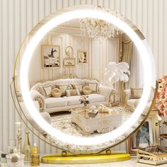 a living room filled with furniture and a round mirror