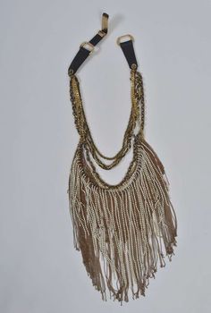 Otazu Fringe Necklace 5 Luxury Multi-strand Chain Necklaces, Gold Embellished Evening Necklaces, Gold Embellished Evening Necklace, Bronze Jewelry For Party, Beaded Long Chain Necklace For Parties, Gold Beaded Necklaces For Evening, Luxury Gold Beaded Necklace For Party, Elegant Gold Beaded Chain Necklace For Party, Gold Beaded Chain Jewelry For Evening