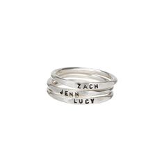 Our best-selling handmade personalized stacking ring is a minimalist masterpiece. Handstamped with teeny tiny 1mm letters, this ring' truly stands out from the rest. With its customizable design, you can add names, dates, or words that hold special meaning to you. The teeny tiny letters make it so special and unique. Crafted with quality sterling silver / 14k gold filled, our jewelry is made to last, to ensure its longevity Each letter is carefully handstamped with love. Metal: 14k Gold Filled o Adjustable Personalized Silver Stackable Rings, Dainty Sterling Silver Ring With Custom Name, Stackable Sterling Silver Rings For Personalized Gift, Minimalist Silver Ring For Personalized Gift, Custom Name Sterling Silver Stackable Promise Rings, Adjustable Hand Stamped Initial Ring Minimalist, Adjustable Hand Stamped Minimalist Initial Ring, Adjustable Minimalist Hand Stamped Initial Ring, Everyday Silver Engraved Ring With Custom Name