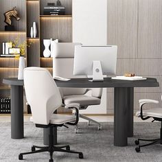 an office desk with two chairs and a laptop on it in front of a bookshelf