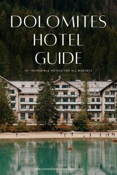 the dolmites hotel guide is shown in front of a body of water and trees