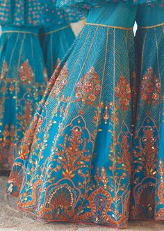 Bringing the essence of tradition and modernity, amyra sharara set is an attire that brings only adulations. The ensemble comprises of sharara pants with floral embroidery and embellishment. The peplum has an intricately done yoke, featuring a sheer layer of floral embroidery with dori at the back. Blue Palazzo Set With Dabka Work For Reception, Blue Palazzo Set For Reception And Festivals, Blue Anarkali Palazzo Set For Reception, Anarkali Blue Palazzo Set For Reception, Floor-length Sets With Intricate Embroidery For Navratri, Festival Palazzo Set With Dori Work For Reception, Navratri Sets With Intricate Embroidery In Floor-length, Blue Bohemian Sharara For Reception, Anarkali Style Embroidered Sharara For Reception